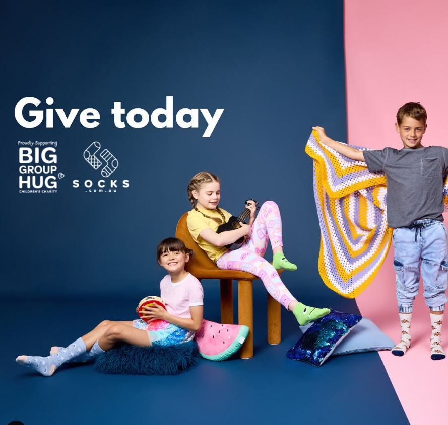 Supporting Big Group Hug To End Child Poverty, One Pair Of Socks At A Time